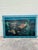 A large contemporary coastal painting depicting a vibrant underwater seascape, beautifully rendered with tropical reef...
