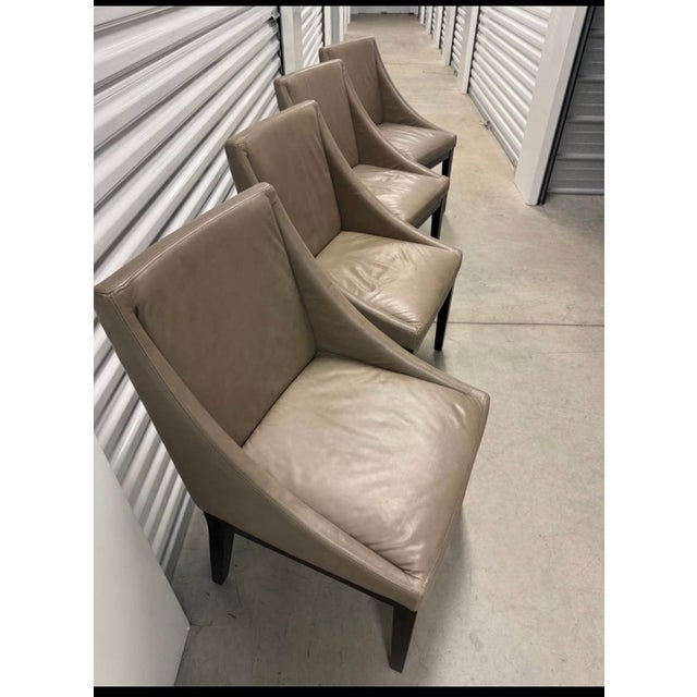 Set of 4 beautifully maintained West Elm Leather chairs. Good for a dining room table or side chairs. Tan leather with...