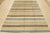 This contemporary striped rug is hand-knotted with a fine all-wool pile on a cotton foundation. This rug is new and in...
