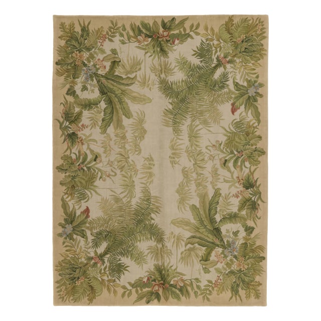 This 9x12 antique French Aubusson rug is a distinguished wool piece from France dating to circa 1890-1900. The rug...