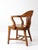 Early 20th-century Windsor captain's chair crafted with the timeless character and enduring appeal of traditional American...