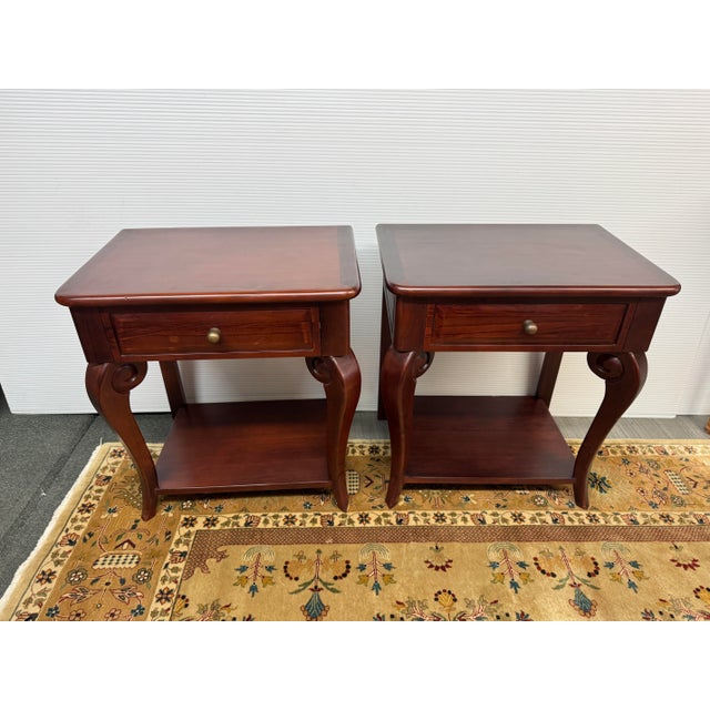 Design Plus Gallery presents a Pair of End Tables/ Nightstands with Georgian Design Style. They have a stain of reddish...