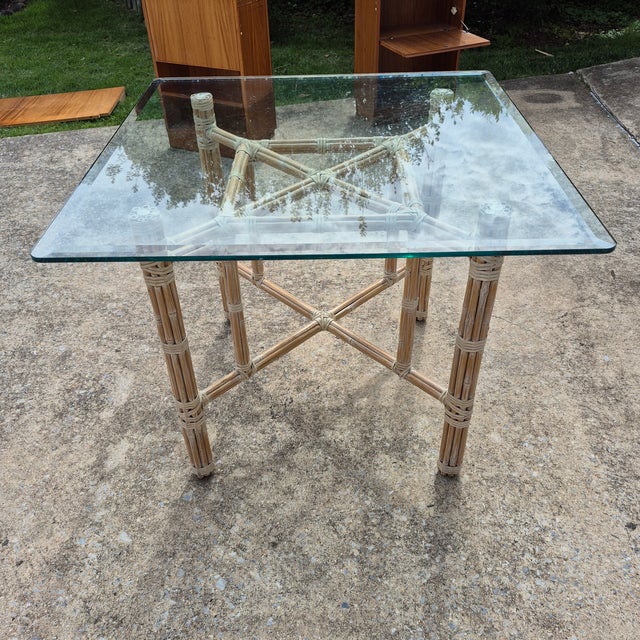 Wood 1970s McGuire Attributed Organic Modern Square Glass Top Rattan Rawhide Base Dining Table For Sale - Image 7 of 13
