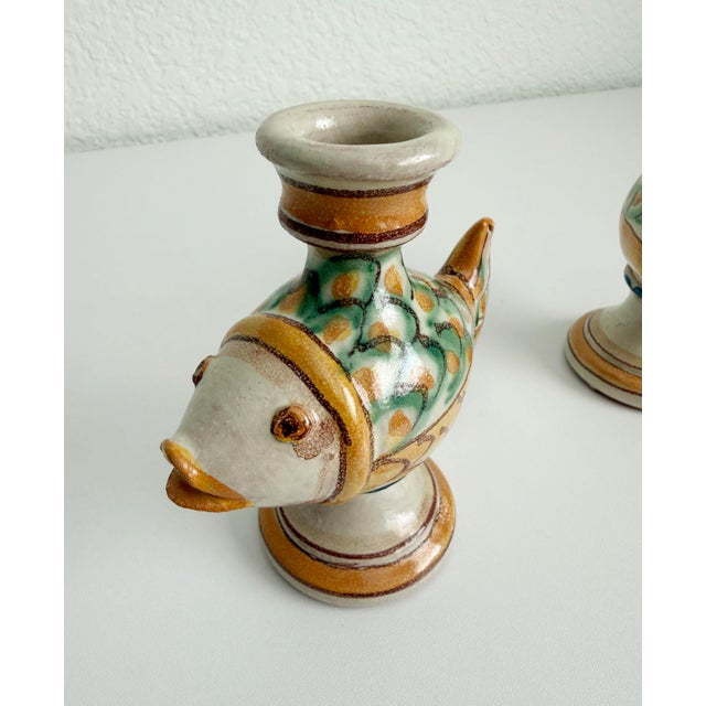 Italian pottery candle holders crafted in Caltagirone by artist Giacomo Alessi using techniques perfected in the region...