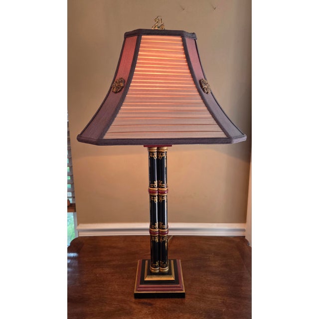 Hollywood Regency meets classic Chinoiserie. Sculpted faux bamboo column detailing in black, red and gold. Horizontal...