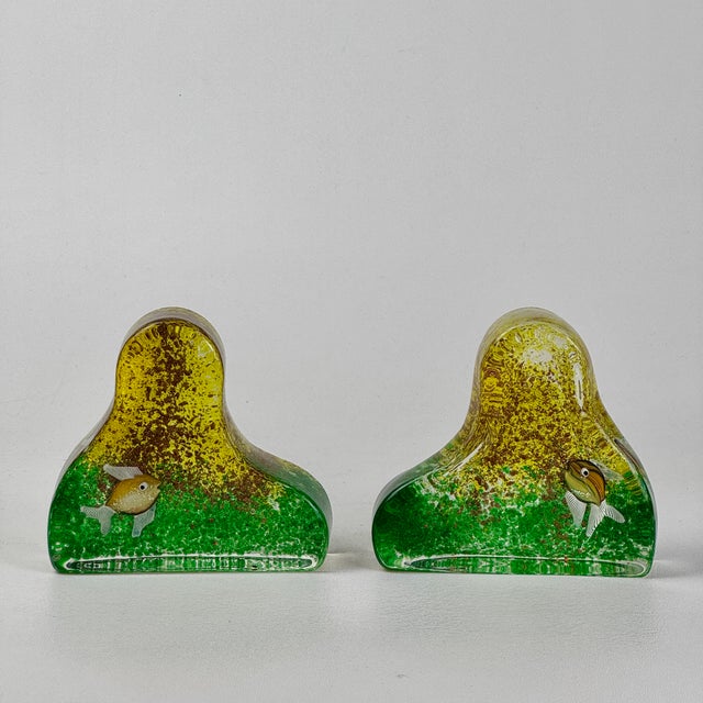 It was the quirky shape of these vintage pieces that grabbed our attention and heart. A pair of whimsical glass bookends...