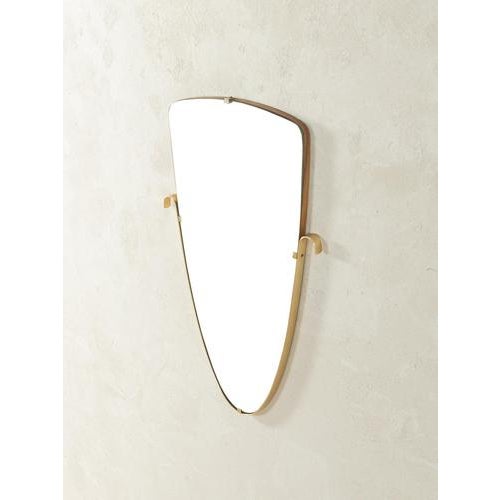 1950s Mid-Century Wall Mirror elegant lines and finely tuned proportionshigh-quality craftsmanship using premium...