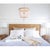 Milos beaded chandelier combines natural tones and textures for an eclectic and layered fixture. Its rattan-wrapped frame...