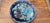 Bring vibrant color and exotic elegance to your collection with this striking vintage decorative porcelain charger plate....