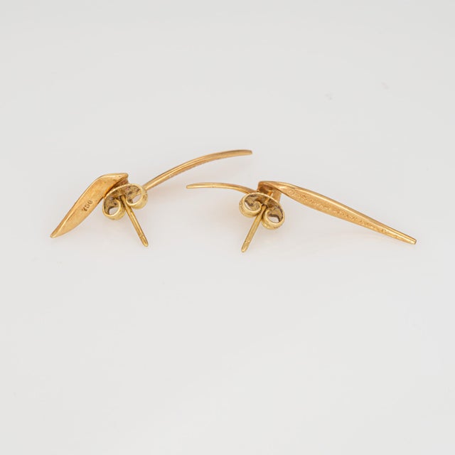 Finely detailed pair of vintage Tiffany & Co Chrysalis earrings crafted in 18k yellow gold. Dating to 1983 the stylized...