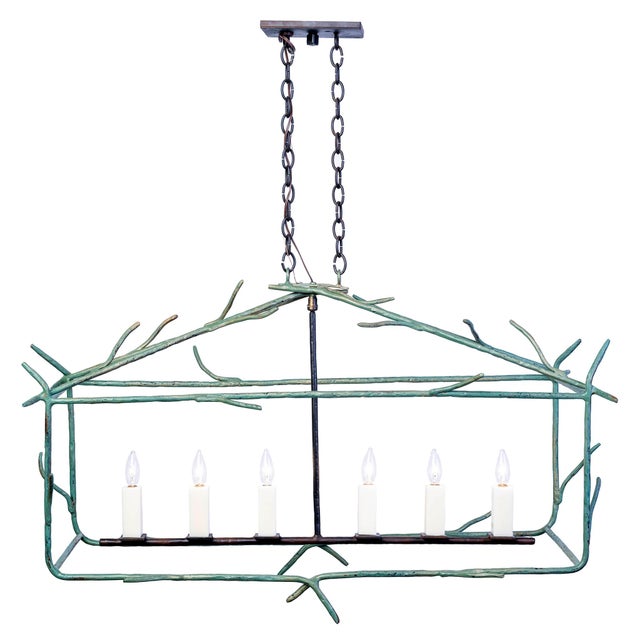 The hand-hammered twig-like accents in the Marshland Chandelier are inspired by the Lowcountry marsh landscape. Natural...