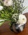 Ceramic vase with a delicate floral relief and glazed finish. Produced by the west german pottery workshop töpferhof...