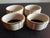 These are GORGEOUS LENOX USA Fine Porcelain Gilded Beige 2" Napkin Rings Set of 4. Procured at Estate auction BOX 11