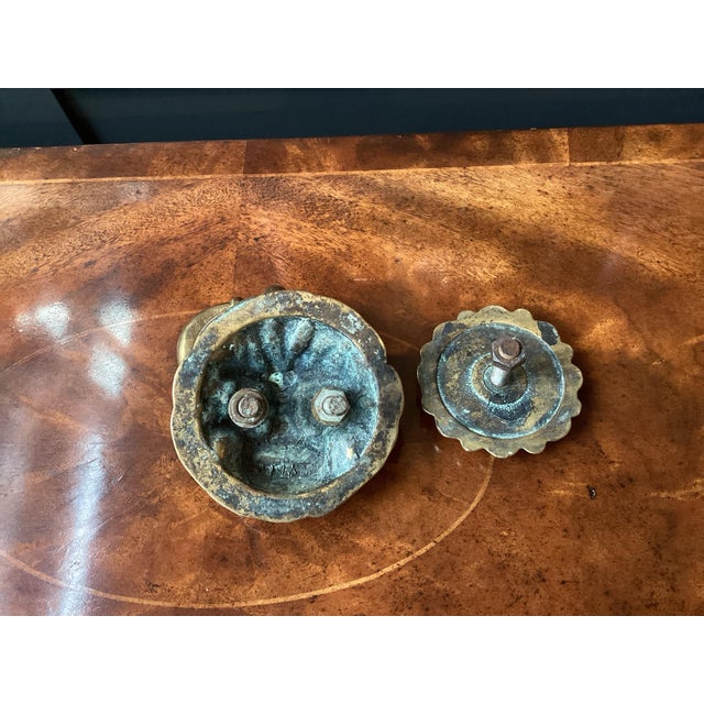 This is a striking late-19th-century French lion head door knocker cast in solid bronze with its original mounting...