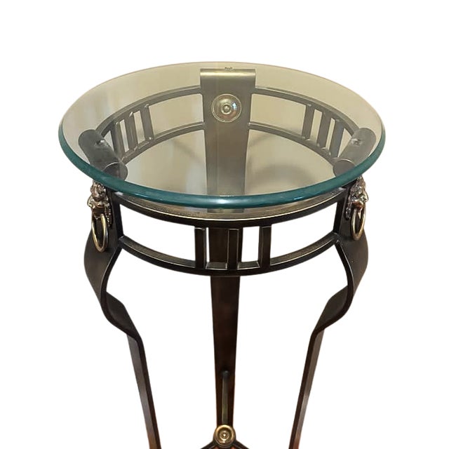 Elevate your décor with this elegant neoclassical-inspired pedestal plant stand, featuring a sleek metal frame accented...