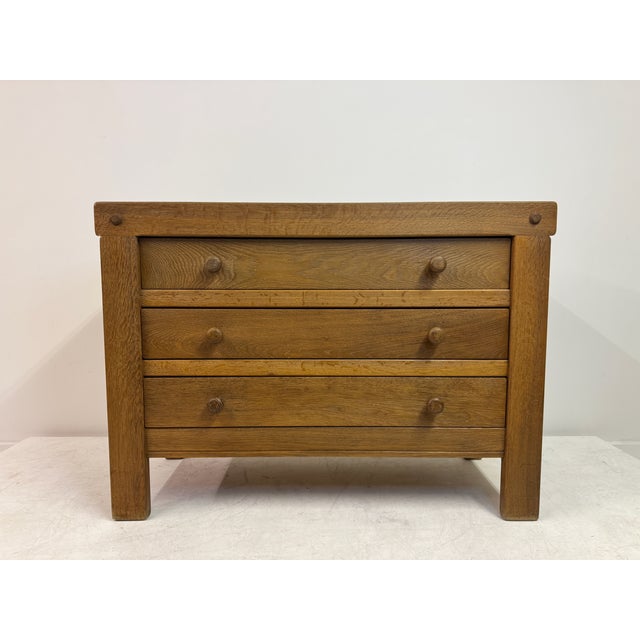 Brutalist Oak Chest of Drawers, 1970s A solid and quietly sculptural Brutalist chest of drawers in oak, likely dating from...