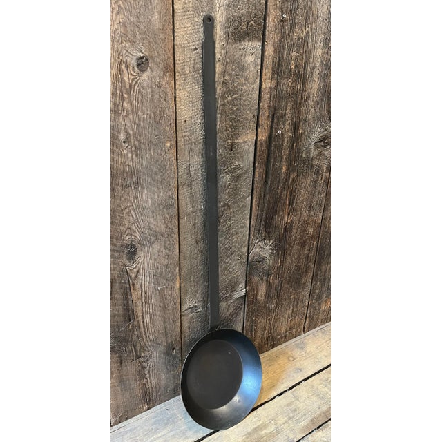 Nice vintage French long handled cooking pot. Marked FRANCE. Hole for hanging at the end of the handle . Dimensions: W:...