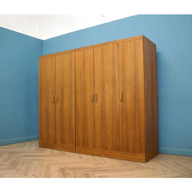 Mid century g plan quadrille double wardrobe in teak, dating from the 1960s. A clean, minimal design with recessed...