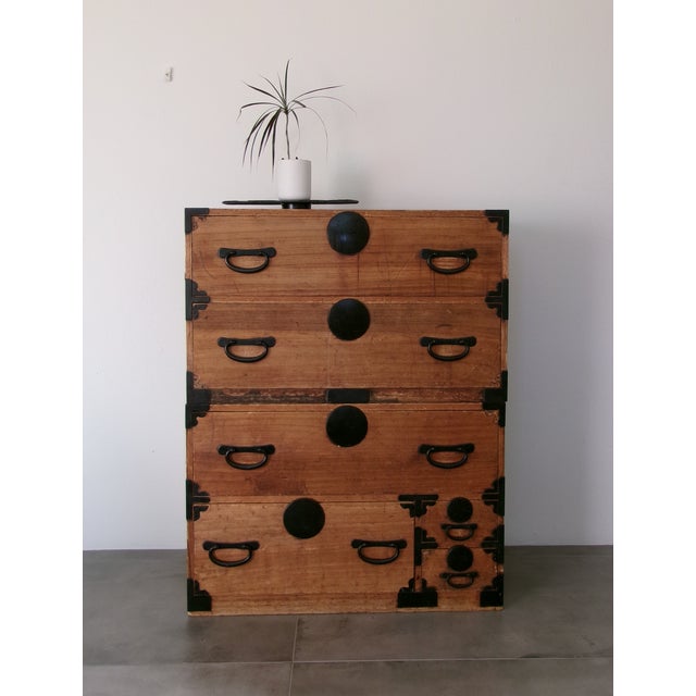 Early 20th Century 2 Part Japanese Kiri Tansu Dresser. A fine two part Japanese tansu chest in cypress and kiriwood. Three...