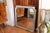 A finely carved 18th century French mirror with a weathered pale grey painted finish, the details are beautifully...
