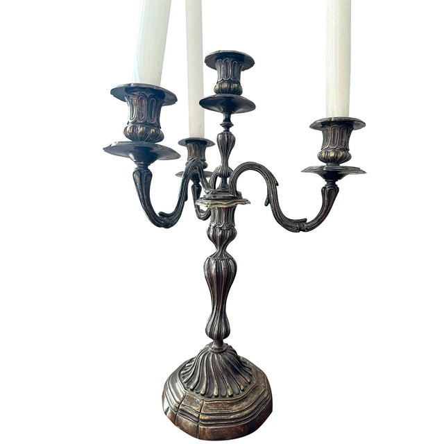 Elegant and sculptural, this antique-style silver gilt candelabra makes a dramatic statement on any dining table, mantel,...
