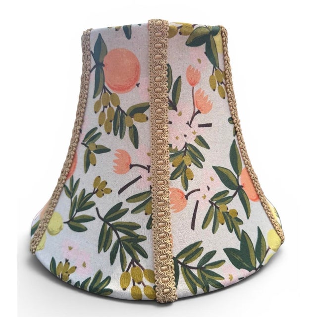 Bring a fresh, designer touch to your home with this handcrafted lampshade covered in authentic Rifle Paper Co. Primavera...
