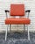 This is a gorgeous vintage Mid Century Modern orange aluminum arm chair by Good Form. It features a very atomic look,...