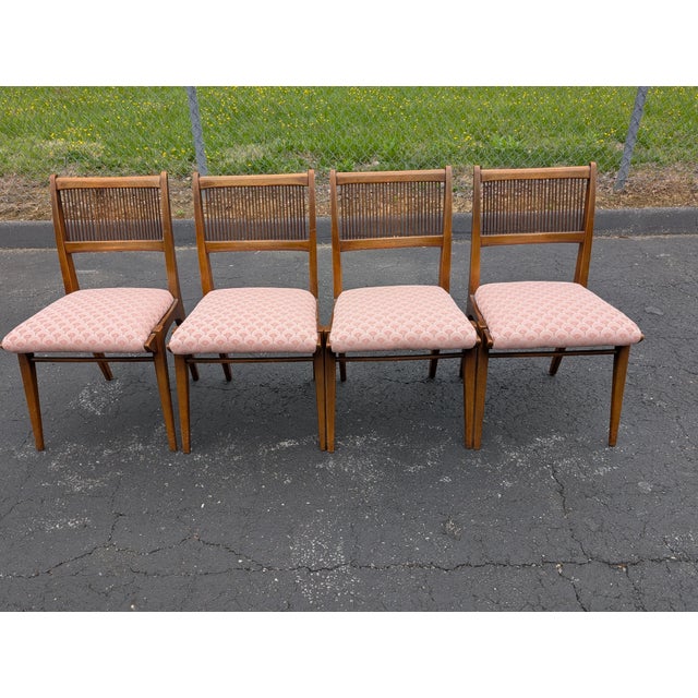This exceptional set of four mid-century modern dining chairs from the iconic "Profile" series, designed by John Van Koert...