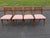 This exceptional set of four mid-century modern dining chairs from the iconic "Profile" series, designed by John Van Koert...