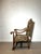 This elegant piece stands out thanks to its sculpted armrests, carved front stretcher and claw feet. The upholstery...