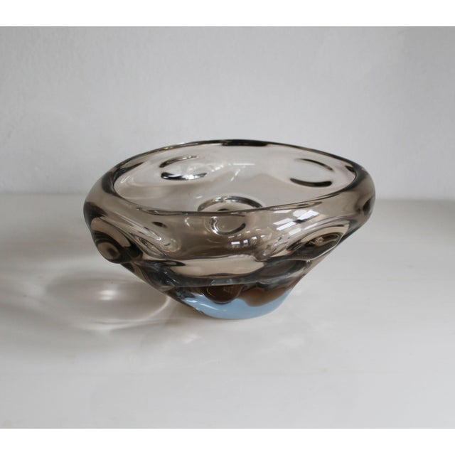 Some pieces of glass seem to hold their own atmosphere, a sense of movement and luminosity that shifts as you turn them in...