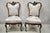 Antique Victorian Floral Scrollwork Carved Mahogany Parlor Slipper Side Chairs - a Pair. Item features floral scrollwork...