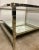 Original Retail $2997, stylish Caracole Modern Geometric Prince Charming Cocktail Table, linear metal frame finished in a...