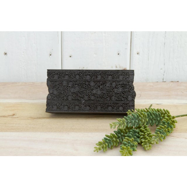 A vintage wooden printing block from India, it is hand-chiseled by artisans and its used to hand print textiles. It...