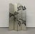 A decorative four-panel folding screen featuring a luminous silver-leaf finish accented by bold, abstract botanical motifs...