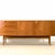 Designed by Tom Robertson for A.H. McIntosh in Scotland in the 1970s , this exquisite sideboard belongs to the prestigious...