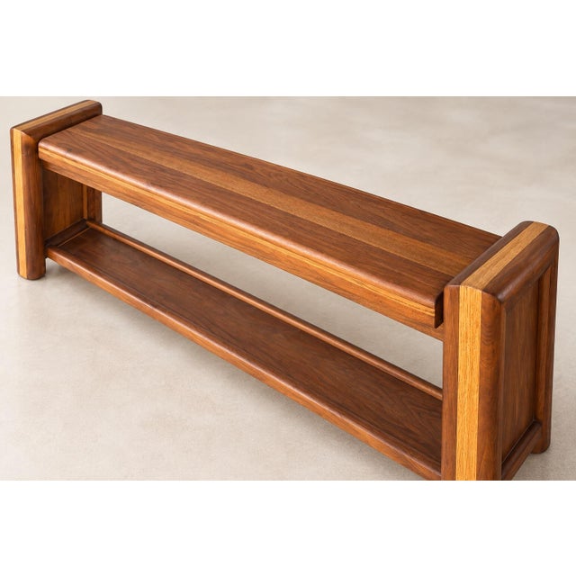 This distinctive vintage solid-wood bench combines substantial construction with an unusually streamlined, architectural...