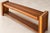 This distinctive vintage solid-wood bench combines substantial construction with an unusually streamlined, architectural...