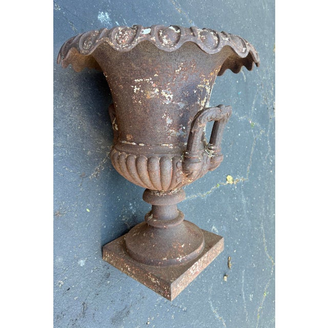 This antique late Victorian heavy cast iron outdoor planter features a classic design with a large size and exquisite...