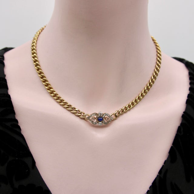 The centerpiece of this 14k gold Victorian necklace is a beautiful diamond and sapphire element comprised of Rose Cut, Old...