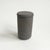 This is a lidded ceramic jar which features a sandy and rough feel on the exterior in a grayish brown color. Likely made...