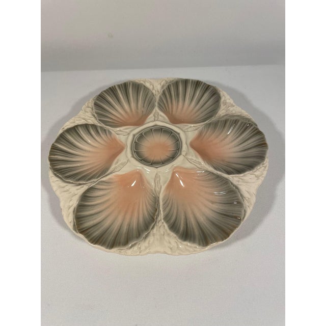 A stunning hand crafted ceramic Majolica Sarreguemines Oyster Plate made in northern France. Circa 1920s. Maker's marks...