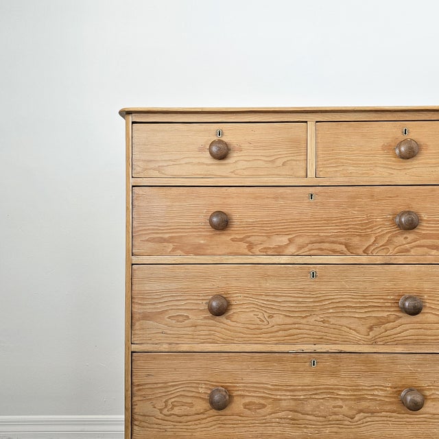Dimensions 21.25"D x 41.5"W x 44.75"H A beautifully aged English pine chest with striking natural grain movement and a...