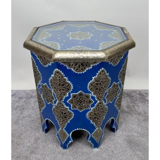 The pair of Moroccan boho chic white brass inlaid side tables in blue Majorelle is inspired by the legendary Yves Saint...