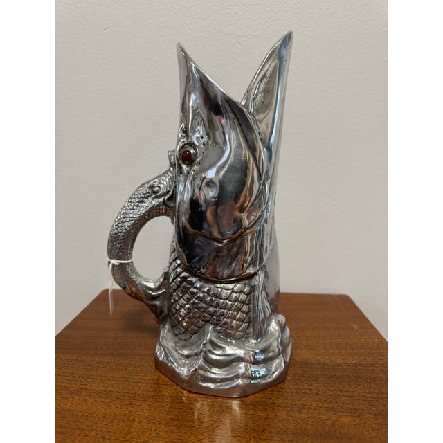 A striking and highly collectible figurative pitcher by Arthur Court, the celebrated San Francisco designer known for his...