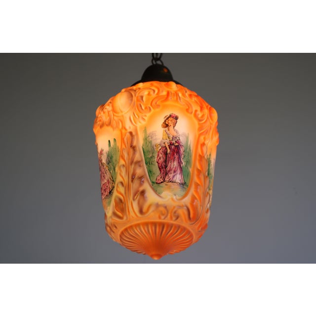 Marvelous hand painted opaline pendant light from France 1910s displaying 4 woman in victorian / renaissance style...