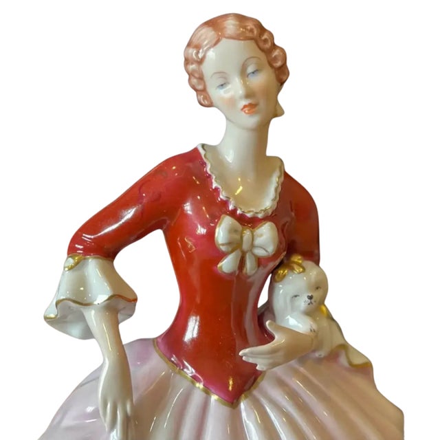 This superbly detailed vintage Royal Dux porcelain figurine, originating from former Czechoslovakia, captures the elegance...