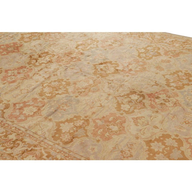 Hand-knotted wool and believed to originate from Romania circa 1950-1960, this 8x11 vintage rug is a particularly special...