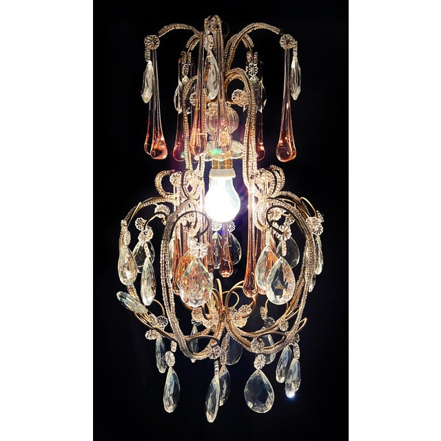 Fascinating Murano chandelier dedicated to the divine Katharine Hepburn. Height 57 cm, diameter 32 cm. One light E27 Up to...