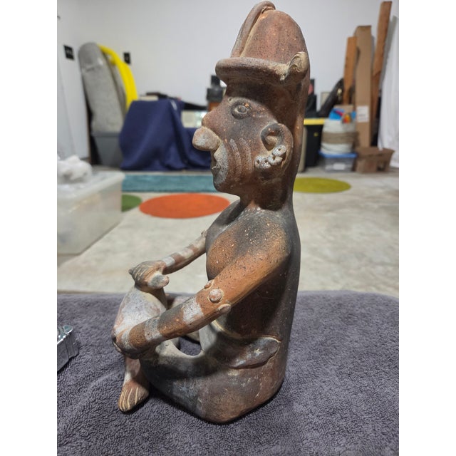 Statue of Musician playing drums from Nayarit culuture in West Mexico. 200 BC - 300AD From an artist private...